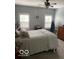 Bright bedroom featuring a ceiling fan and plantation shutters at 3354 Nottinghill Dr, Plainfield, IN 46168