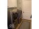 Laundry room featuring stainless steel washer and dryer at 3354 Nottinghill Dr, Plainfield, IN 46168