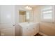 Bright bathroom with white vanity, modern fixtures, and large mirror at 3626 N Capitol Ave, Indianapolis, IN 46208