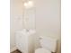 Cozy bathroom featuring a toilet and a single sink vanity at 3626 N Capitol Ave, Indianapolis, IN 46208