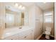 Bright bathroom with white vanity, modern fixtures, and large mirror at 3626 N Capitol Ave, Indianapolis, IN 46208