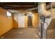 Unfinished basement with stairs leading up to the first floor and utility access at 3822 Haverhill Dr, Anderson, IN 46013