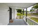 Welcoming covered front porch with a stylish railings, and a 'hello' door mat at 3822 Haverhill Dr, Anderson, IN 46013
