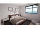 Charming bedroom features a large window with water views and butterfly artwork at 3925 Besbie Way, Bargersville, IN 46106