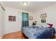 Inviting bedroom with hardwood floors, soft lighting, and ample space at 4218 E 18Th St, Indianapolis, IN 46218
