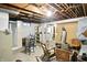Spacious unfinished basement with laundry area, storage, and shower; great for a personalized space at 4340 Ashbourne Ln, Indianapolis, IN 46226
