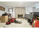 Spacious unfinished basement with brick fireplace, perfect for customization and ample storage at 4340 Ashbourne Ln, Indianapolis, IN 46226