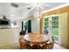 Inviting dining room with views of the backyard and open to the living room area at 4340 Ashbourne Ln, Indianapolis, IN 46226
