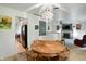 Open concept dining room provides views to the kitchen, living room, and the backyard at 4340 Ashbourne Ln, Indianapolis, IN 46226
