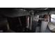 Unfinished basement with exposed duct work and water heater at 435 N Rural Ne St, Indianapolis, IN 46201