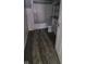 A compact bathroom featuring a bathtub, toilet, and a sleek vanity, all within a well-lit space at 435 N Rural Ne St, Indianapolis, IN 46201