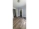 Bedroom featuring neutral gray walls and attractive wood-look floors at 435 N Rural Ne St, Indianapolis, IN 46201