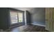 This bedroom is a cozy retreat with natural light streaming through the window at 435 N Rural Ne St, Indianapolis, IN 46201