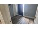 Bedroom featuring neutral walls and wood-look floors at 435 N Rural Ne St, Indianapolis, IN 46201