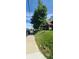 Home featuring front yard with steps leading to the front, and large shade tree at 435 N Rural Ne St, Indianapolis, IN 46201