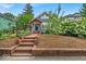 Charming two-story home featuring well-maintained landscaping and an inviting brick entryway at 4356 N College Ave, Indianapolis, IN 46205