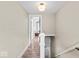 Upstairs hallway with wood floors and natural light at 4356 N College Ave, Indianapolis, IN 46205