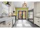 Bright kitchen with stainless steel appliances, ample storage, and direct access to the backyard at 4356 N College Ave, Indianapolis, IN 46205