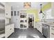 Well-equipped kitchen with modern appliances, custom cabinets, and stylish lighting at 4356 N College Ave, Indianapolis, IN 46205