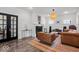 Open living area with a modern fireplace, unique furnishings, and an open floor plan at 4356 N College Ave, Indianapolis, IN 46205