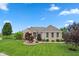 Charming single-story brick home with a well-manicured lawn and mature landscaping at 4434 Hickory Ridge Blvd, Greenwood, IN 46143