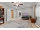 Spacious primary bedroom features access to a walk in closet and a view of the Gathering room at 4434 Hickory Ridge Blvd, Greenwood, IN 46143