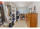 Organized walk in closet provides ample storage space with shelving and built in drawers at 4434 Hickory Ridge Blvd, Greenwood, IN 46143