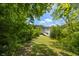 Pathway leading to private dock on a serene lake with lush surroundings at 4446 Lakeridge Dr, Indianapolis, IN 46234