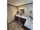 Bathroom featuring a sink, mirror, storage vanity, and decorative accents at 509 S E St, Arcadia, IN 46030