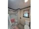 This bathroom features a glass-doored shower and convenient toilet at 509 S E St, Arcadia, IN 46030