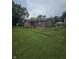 Exterior home view with well-kept lawn and garden area at 509 S E St, Arcadia, IN 46030
