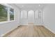 A bright living room with windows and wood floor at 5550 W Mooresville Rd Byp, Indianapolis, IN 46221