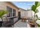 Cozy backyard patio with stylish furniture, outdoor rug, and privacy fence creating a relaxing retreat at 564 Parkhurst Ct, Greenwood, IN 46142
