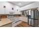 Well-equipped kitchen featuring white cabinets, modern appliances, and plenty of counter space at 564 Parkhurst Ct, Greenwood, IN 46142