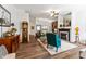 Spacious living room with hardwood floors, fireplace and ample seating at 564 Parkhurst Ct, Greenwood, IN 46142