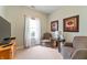 Sitting room with neutral carpet, comfortable seating, natural light, and a TV at 564 Parkhurst Ct, Greenwood, IN 46142