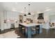 Spacious kitchen with large center island, custom cabinets, designer backsplash and stainless appliances at 5706 Bentbrook Dr, Bargersville, IN 46106