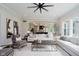 Bright living room showcasing an open floor plan, hardwood floors, neutral paint, and modern decor at 5706 Bentbrook Dr, Bargersville, IN 46106