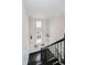 Bright stairwell with window seat and accent pillows leads to the upper level of the home at 5706 Bentbrook Dr, Bargersville, IN 46106