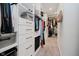 Organized walk-in closet provides ample storage space with custom shelving and hanging rods at 5706 Bentbrook Dr, Bargersville, IN 46106
