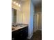 Bathroom featuring a double vanity and stylish fixtures at 5932 Edelle Dr, Indianapolis, IN 46237