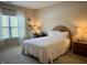 Comfortable bedroom with a full-size bed, a window and neutral walls at 5932 Edelle Dr, Indianapolis, IN 46237