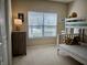 Cozy bedroom featuring a bunk bed and natural light from the large window at 5932 Edelle Dr, Indianapolis, IN 46237