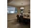 This dining room boasts modern decor and an open concept design at 5932 Edelle Dr, Indianapolis, IN 46237
