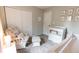 Well-organized Bedroom with closet storage, comfortable seating, and charming decor at 63 Longfellow Ln, Greenfield, IN 46140