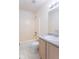 Full bathroom with neutral finishes, including a tub/shower combo and a vanity with storage at 6937 Thousand Oaks Dr, Indianapolis, IN 46214