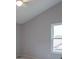 Bedroom featuring a ceiling fan and a large window for natural light at 6937 Thousand Oaks Dr, Indianapolis, IN 46214