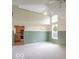 Inviting living room featuring an open floor plan, vaulted ceiling, and lots of natural light at 6937 Thousand Oaks Dr, Indianapolis, IN 46214