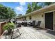 Spacious backyard deck featuring multiple seating areas for relaxing and socializing at 7113 Chandler Dr, Indianapolis, IN 46217