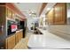 Efficient kitchen layout with light countertops, wood cabinets, and stainless steel appliances at 7113 Chandler Dr, Indianapolis, IN 46217